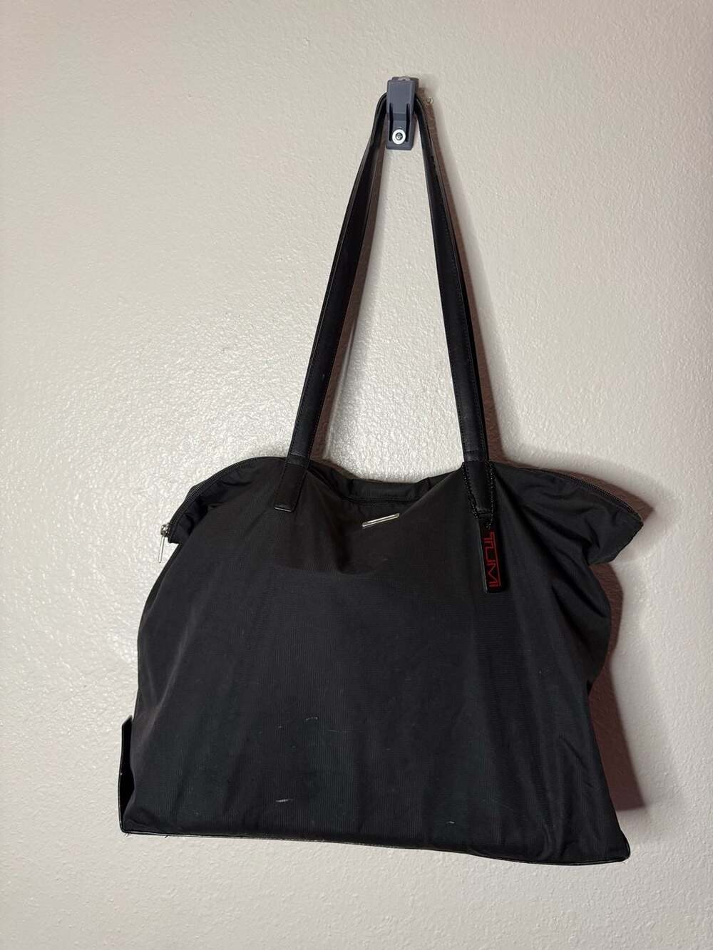 Tumi Black Nylon Tote Bag with Leather Straps and Red Tag